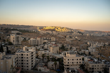 Fototapeta premium Old Bethlehem Cityscape in the Foreground and Newer Colonies in the Background with White Stone Classic Architecture