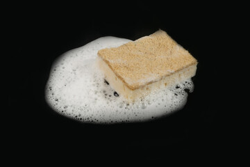 Natural Soapy Sponge with Foam, Eco Brown Sponges, Eco Friendly Hygiene Accessory on Black Background