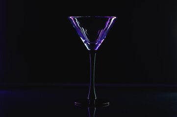 silhouette of martini glass on black background