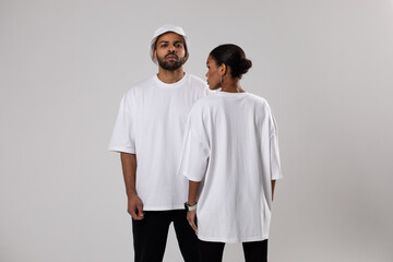 African american couple in white t-shirts. Man in white panama. Mock-up.