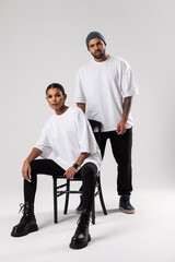 African american couple in white t-shirts. Mock-up.