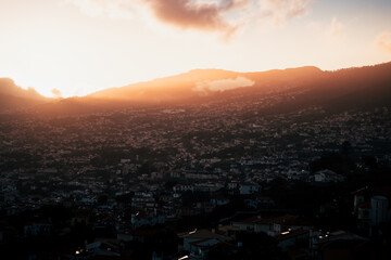 drone view of funchal night city, lights and darkness
