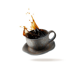 Vintage dark cup with splashing hot espresso coffee falling flying isolated 