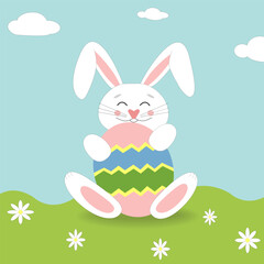 white easter bunny rabbit holding a big colorful Easter egg outside