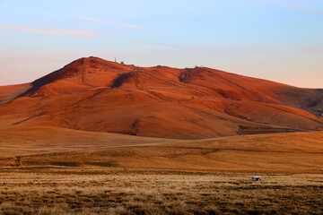 Autumn alpine landscape of Bucegi Mountains in sunset light, Romania, Europe	