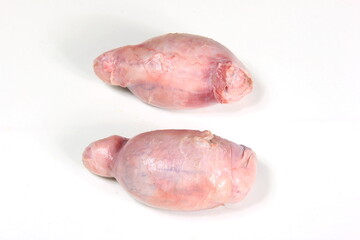 Raw lamb testicles on white background