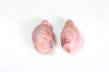 Raw lamb testicles on white background