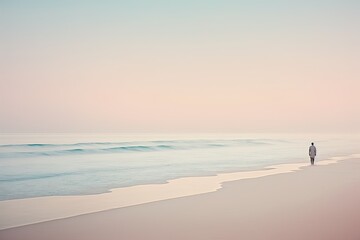 Dreamlike Soft Colors Peaceful Beach With Tranquil Waves. Lone Figure Standin on Shore. Generative AI. - obrazy, fototapety, plakaty
