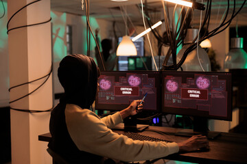 Cyberattack alert message on computer screen, hacker stealing password, internet criminal breaking into database. Malware attack, web virus cyber security, man writing malicious software code