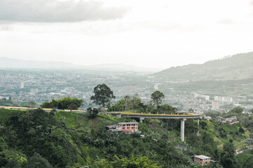 Fototapeta na wymiar panoramic view of the elicoidal bridge located in dosquebradas risaralda, in the background the city of pereira.
