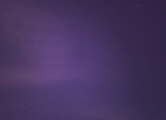 Fototapeta na wymiar Purple starry sky background