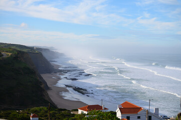 Magoito Beach during storm and high waves, beautiful sandy beach on Sintra coast, Lisbon district,...