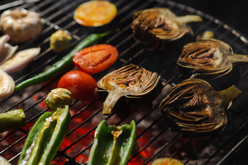 Green grilling. Various vegetables - artichokes, peppers, eggplants are grilled. Close-up. Healthy food concept. Vegetarianism.