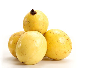 yellow guava, ripe guava fruit isolated on white background with space for text