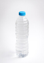 Plastic bottle of drinking water, on white background.