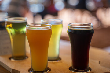Beer flights are small servings of various beers. There are around 4-8 varieties depending on the brewery. Customers will receive a small 3 – 5 oz. glass of each beer. There are photo, vector versions