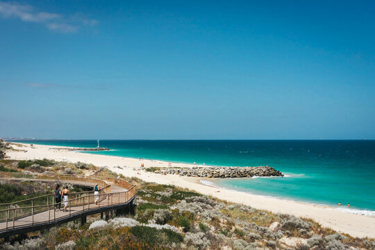 View of the beach and coastal boardwalk that joins Floreat Beach to City Beach in Perth, Western Australia