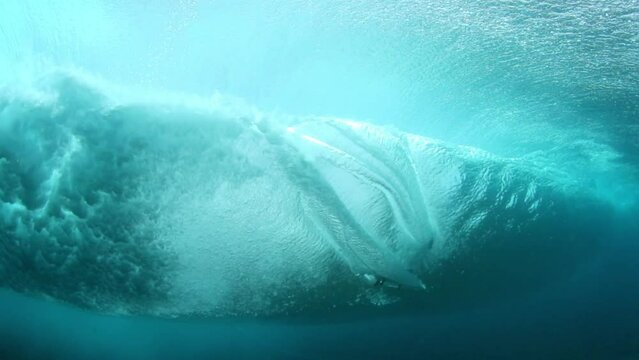 Slow Motion Shot Of Person Surfboarding On Adventurous Vacation Seen From Undersea - Thulusdhoo, Maldives