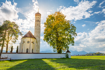 St. Coleman's Church in idyllic Bavarian alps meadows, Schwangau, Germany