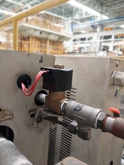 Electric solenoid valve to control system water pipeline in the factory.
