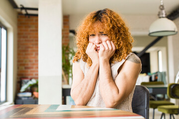 young red hair latin pretty womann at new cool home