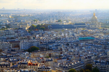 Fototapeta na wymiar Invalides and french roofs from above at sunrise, Paris, France