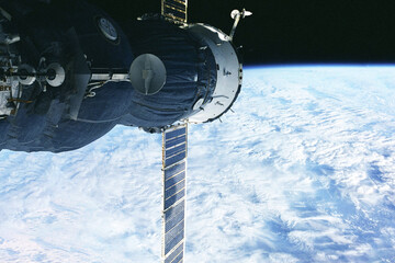 Space satellite above the earth in space. Elements of this image furnished by NASA