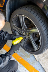 Brake pad and tire change at auto repair shop