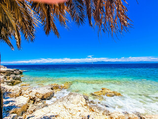 Fototapeta na wymiar Magnificent Blue Lagoon: Turquoise Waters, Azure Sea, and Beach Bliss in a Greek Island Paradise