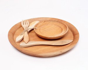 cutlery made of wood crafts. An interesting combination of cutlery in the form of an aesthetic placemat, tray, cup, spoon, fork, chopsticks. Utilizing the remaining wood so that it can be useful.