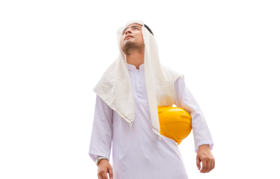Arab man Construction civil engineer at building construction site, Young Saudi skilled professional engineer