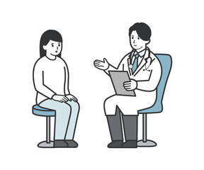 診察する医師と患者の女性