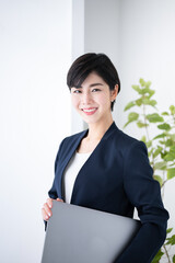 Beautiful Asian woman working in an office