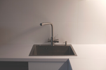 Clean sink in the kitchen. White tabletop. Fly lady method. 