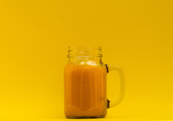 jug of orange juice or mango juice smoothie 