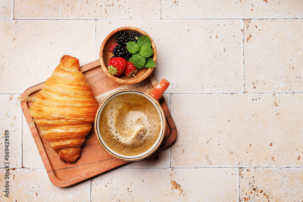 Wall mural Coffee cup and croissant