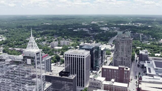 Aerial shot of PNC Plaza and other skyscrapers on Raleigh, North Carolina skyline. American city establishing shot.