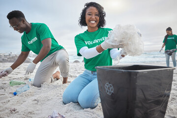 Teamwork, cleaning and volunteer with people on beach for sustainability, environment and eco...