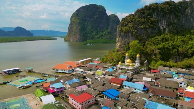 Ko Panyi, also known as Koh Panyee, is a fishing village in Phang Nga Province, Thailand, notable for being built on stilts by Malay fishermen.