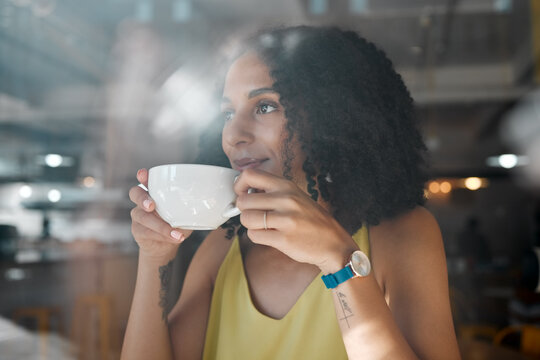 Morning coffee, thinking black woman and coffee shop window with a person in a restaurant. Cafe, sitting and African female with a hot drink of tea enjoying the day with happiness and an idea