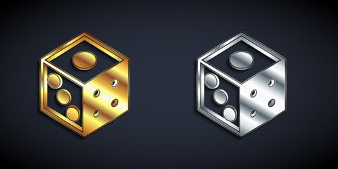 Gold and silver Game dice icon isolated on black background. Casino gambling. Long shadow style. Vector