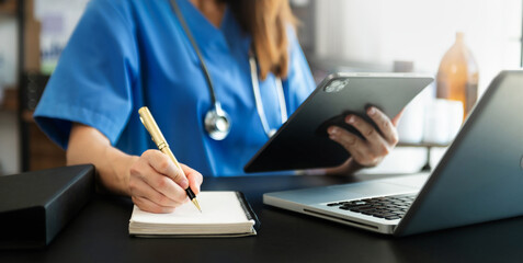 Medical technology concept. Doctor working with mobile phone and stethoscope in modern office..