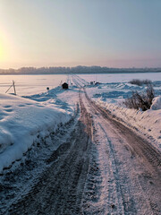 winter river crossing, winter road dawn morning