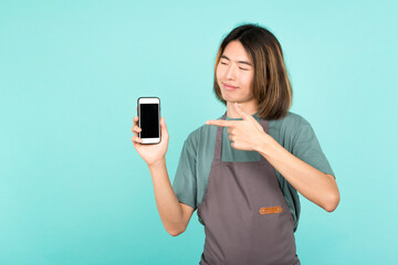 Asian gardener pointing to a mobile screen