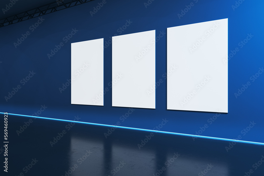 Poster creative blue stage interior with blank white mock up posters on wall. performance and advertisement