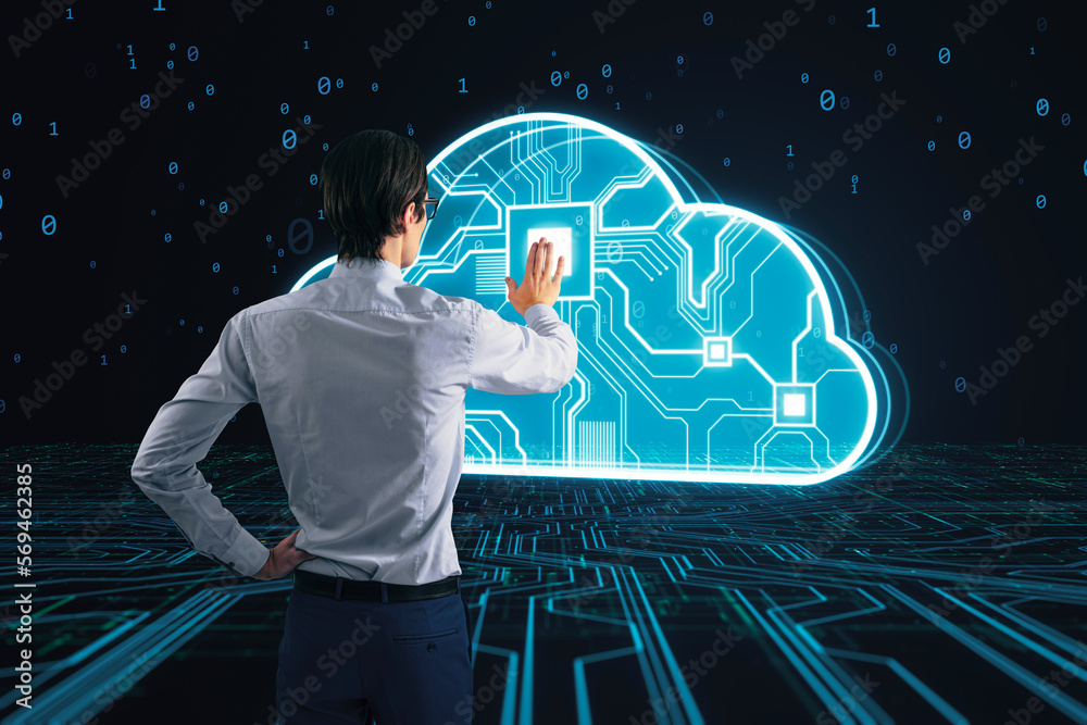 Aufkleber Attractive businessman using glowing cloud computing circuit hologram on dark background. Data storage and technology concept.