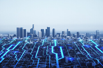Internet of things, high speed connection and smart city concept with digital circuit lines covering megapolis city on blue sky background, double exposure