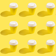 Seamless pattern with coffee cup on yellow background.