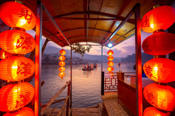 The Pier for tourists to ride chiness boats on the lake at Ban Rak Thai village, Mae Hong Son...