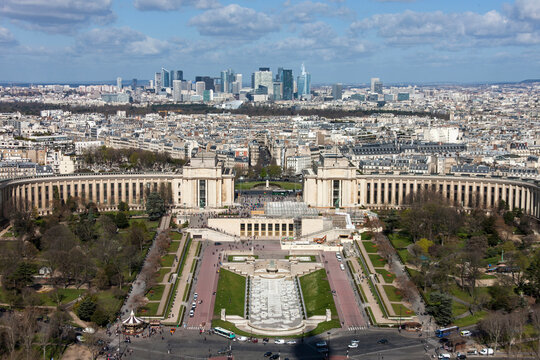 High angle view of Trocadero Gardens and cityscape against cloudy sky, Paris, France